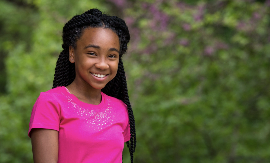 Smiling young mentee — warm candid portrait