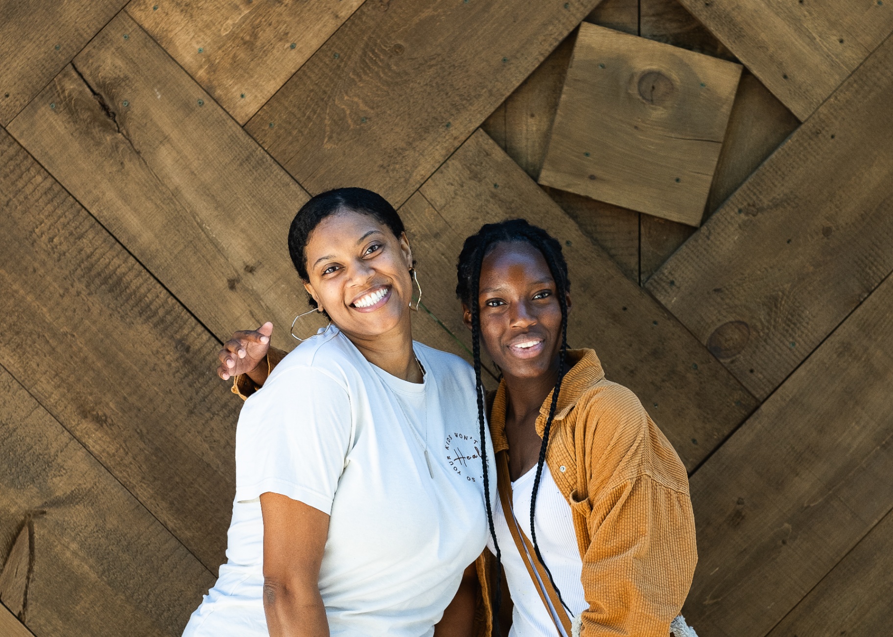 A Sisters Circle mentor and mentee smiling together